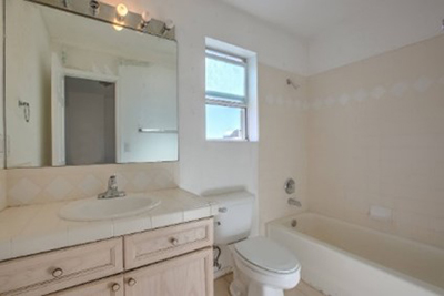 An old-fashioned bathroom dated the house.