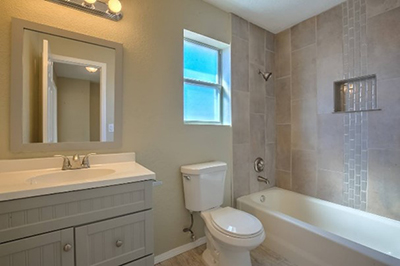 Open and airy, this bathroom is much more inviting.